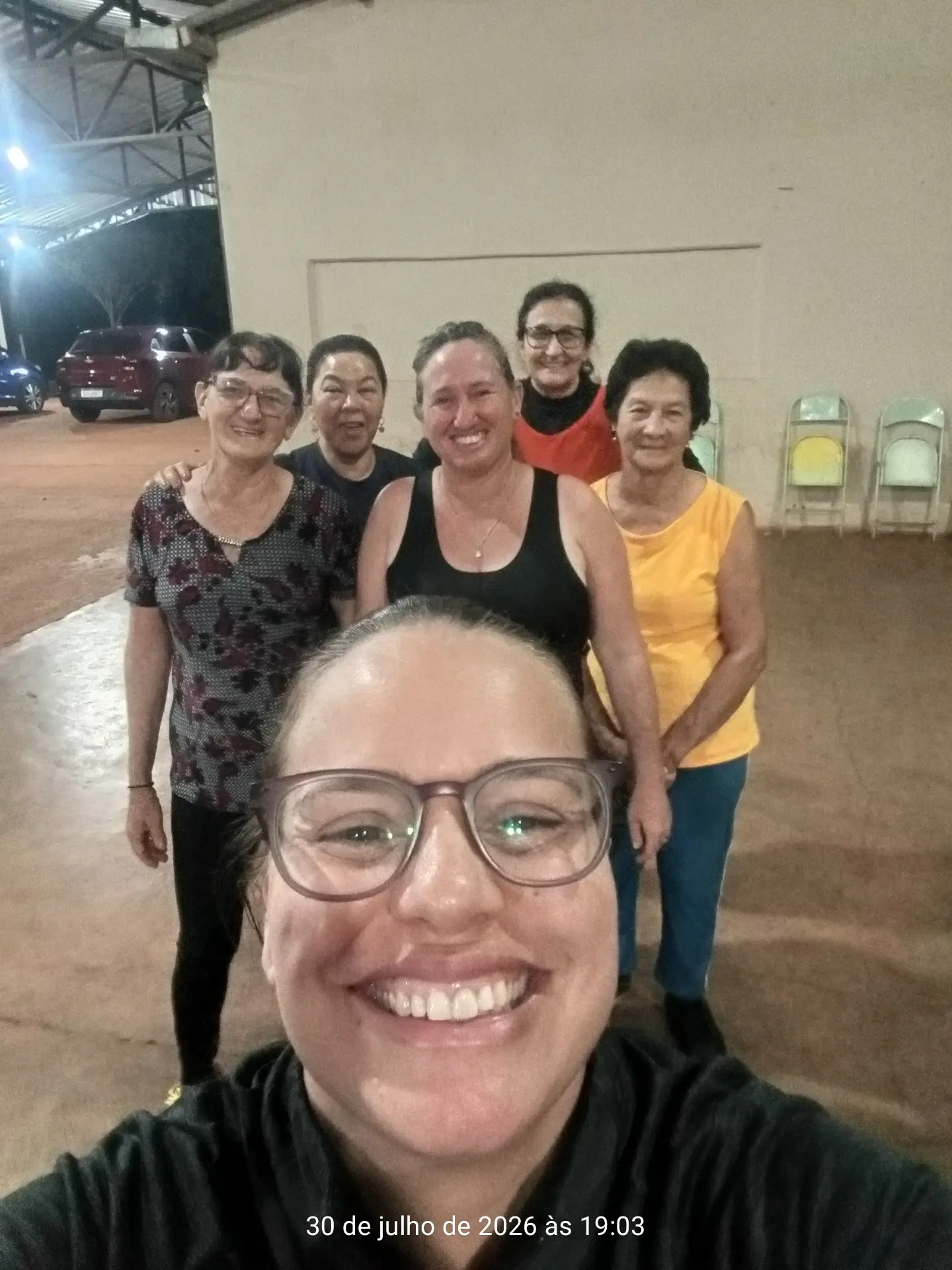 Kelly e participantes após uma atividade acompanhada